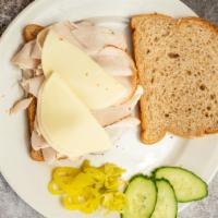 Turkey & Cheese Sandwich · Oven gold turkey and provolone cheese.