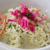 Original Slaw · Shredded green cabbage, carrots, and radishes tossed in a creamy housemade sauce