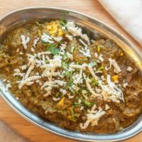 Palak Paneer · Fresh Spinach Cooked Curry Styled With Homemade Cheese, Seasoned With Aromatic Spices.