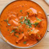 Chicken Tikka Masala · Chicken cubes cooked with onion, peppers in tomato sauce.