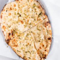 Garlic Naan · Naan with a touch of garlic.