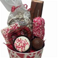 Pink Heart Baskets · Basket includes, a chocolate dipped marshmallows, truffle, a chocolate dipped Oreo, a chocol...