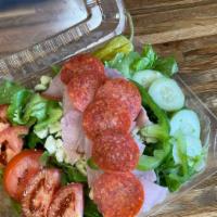 Antipasto · Lettuce, tomatoes, cucumbers, bell peppers, mozzarella cheese, topped with ham & pepperoni.