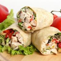 Chicken Salad In A Wheat Wrap · Yummy Chicken Salad with Lettuce and tomatoes.