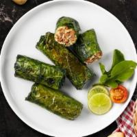 Homemade Dolmas · (Vegetarian) Homemade! Will come with dipping yogurt on the side.