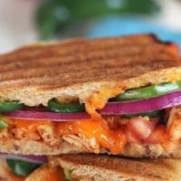 Spicy Chicken Panini · Spicy chicken breast, cheddar cheese, red onion, green pepper, salsa, jalapeños. 176-352 cal.