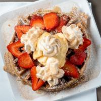 Churro Waffle · Cinnamon Belgian waffle coated with light butter, syrup, cinnamon sugar, whipped cream, ice ...