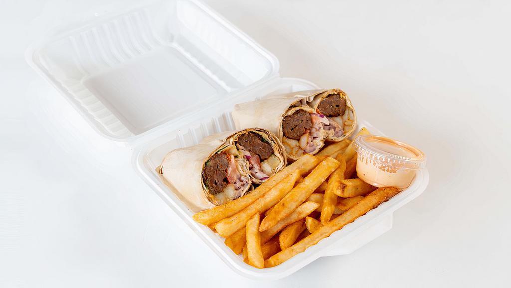 Beef Kabob Wrap Combo · Two Beef Kabob Wraps served with French Fries, Tomatoes, Onion, Cilantro, Parsley, & Jonah's Magic Sauce.