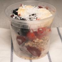 Acai Bowl · Premium organic acai served with granola, banana, strawberry, blueberry, coconut flakes, and...