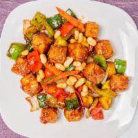 Kung Pao Tofu · Hot and spicy. Zucchini, bell peppers, onions, carrots, celery in spicy sauce topped with pe...