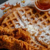 Hot Chicken And Waffle · Sweet cream waffle dusted with powdered sugar served with 2 chicken tenders available in no ...
