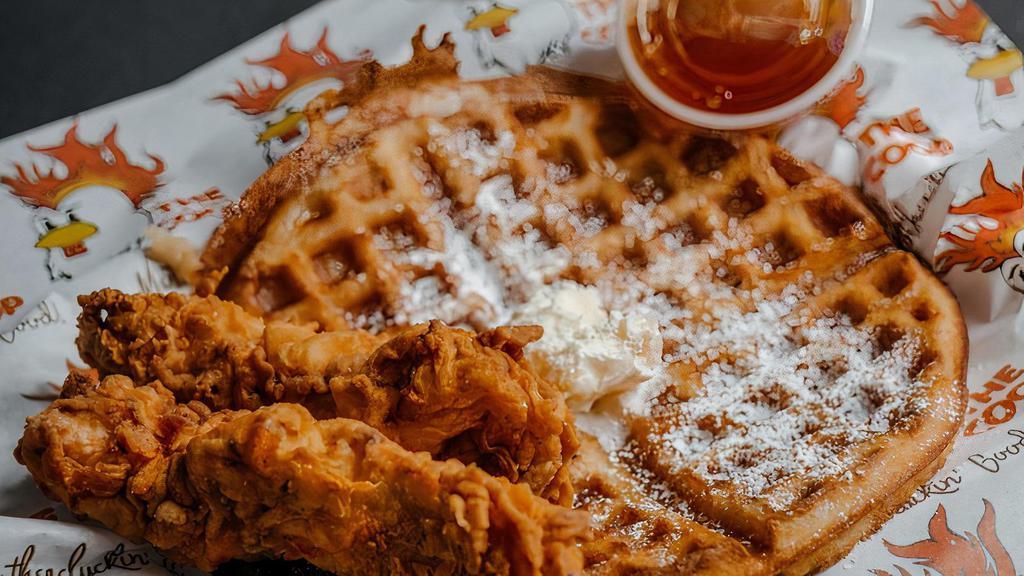 Hot Chicken And Waffle · Sweet cream waffle dusted with powdered sugar served with 2 chicken tenders available in no heat or 3 heat options.