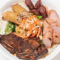 Bun Suon Dai Han, Nem, Lap Xuong & Cha Gio · Vermicelli noodle salad with four items. Vermicelli noodle salad four items. Korean BBQ beef...