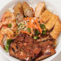 Bun Tom, Ga, Tau Hu Ky & Cha Goi · Vermicelli noodle salad with four items. Grilled shrimp, BBQ chicken, shrimp cake wrapped in...