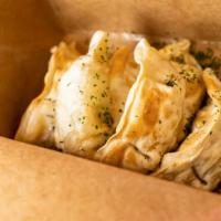 Chicken Potstickers  · Chicken Potstickers authentic pub made. Comes with sweet and tangy sauce