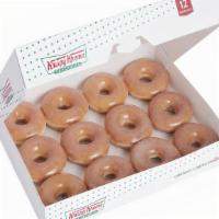 Original Glazed® Dozen · A dozen of our iconic Original Glazed® doughnuts. Our dozens are made fresh daily then deliv...