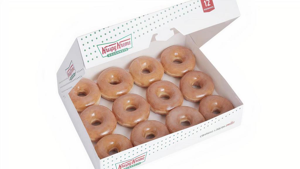 Original Glazed® Dozen · A dozen of our iconic Original Glazed® doughnuts. Our dozens are made fresh daily then delivered to a location near you.