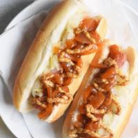 Ny Dog · All-beef sausage, homemade spicy onion sauce, and fresh sauerkraut.