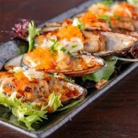 Mussel Heaven  · 6 pieces of baked mussels with special sauce.