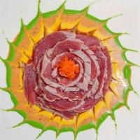Tuna Tataki · Seared red or white tuna with special sauce.
