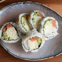 Alaska Roll · Raw. Crab meat, soft shell crab, avocado, cucumber, topped with salmon, seaweed salad.