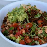 Mexican Brown Rice Bowl · Mixed greens, brown rice, sunflower chorizo, pico de gallo, guacamole, cashew chipotle crema...