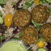 Falafel Bowl · Mixed Greens. Quinoa. Sunflower Carrot Falafel. Persian Cucumber. Cherry Tomato. Sprouts. Gr...