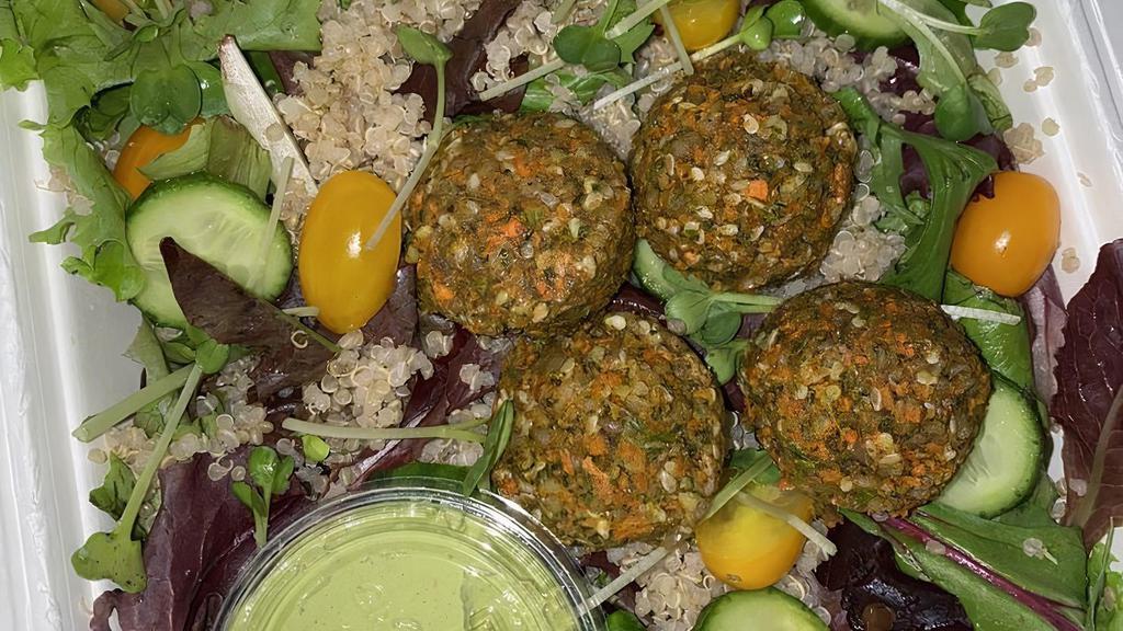 Falafel Bowl · Mixed Greens. Quinoa. Sunflower Carrot Falafel. Persian Cucumber. Cherry Tomato. Sprouts. Green Almond Dressing.