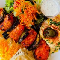 Chicken Kabob Plate · Gluten free. Grilled chicken breast marinated in lemon juice and saffron, with bell peppers ...
