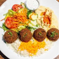 Falafel Plate · Vegetarian, gluten free. Vegetarian patties made from garbanzo beans and spices. Served with...
