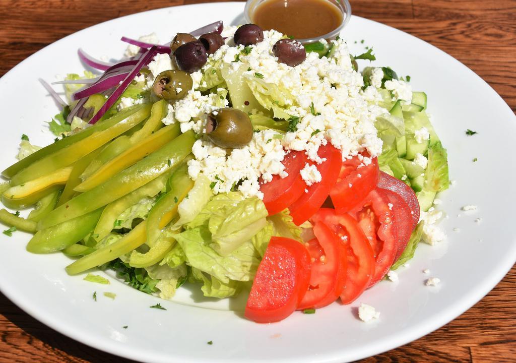Greek Salad · Vegetarian, gluten free. Romaine lettuce, spring green mix, feta cheese, tomato, Persian cucumber, onion, bell pepper, and olive, with balsamic dressing.