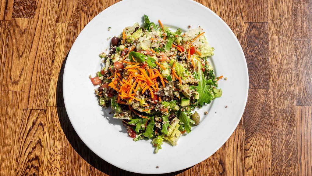 Organic Quinoa Salad · Vegetarian, gluten free. Organic quinoa cooked in vegetable stock with green mix, romaine lettuce, cucumber, tomato, olive and carrots, with a special balsamic dressing.