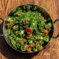 Tabouli Salad · Vegetarian. Chopped Persian cucumber, tomato, parsley, and bulgur with lemon dressing.