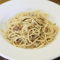 Spaghetti Aglio E Olio · Spaghetti pasta prepared with extra virgin olive oil and grilled garlic with a touch of parm...