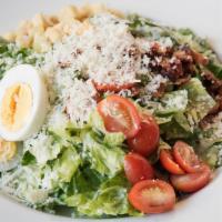 Baja Caesar Salad · Romaine, cherry tomatoes, cherrywood bacon, hard-boiled eggs, Parmesan, avocado, croutons an...