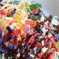 Bbq Salad · Romaine lettuce, corn, black beans, cilantro, cherry tomatoes, scallions, tortilla strips, M...