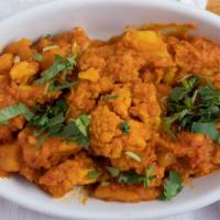 Aloo Gobi · Cauliflower and potatoes cooked with fresh ginger, herbs and spices.