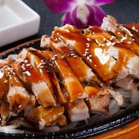 Chicken & Beef Teriyaki · Served in a special teriyaki sauce, topped with sesame seeds.