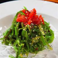 Seaweed Salad · Mineral rich green wakame seaweed with its vinaigrette.