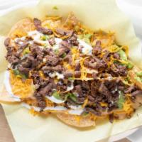 Super Nachos · Your choice of meat With guacamole, sour cream, and cheese.