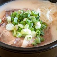 1 Yanggi Soup · Ox bone soup with non fat brisket and comes with Musse sot bap.