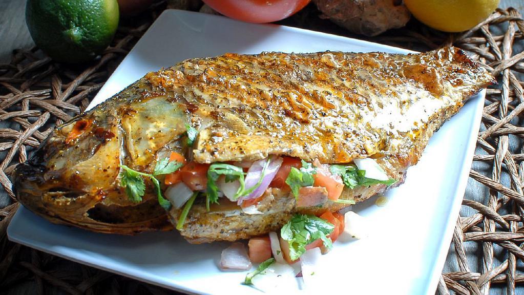 Tilapia (1Pc) · Tilapia is marinated with citrus and dusted with spices, then grilled just right. Stuffed with salsa made from seasoned tomatoes, onions and chili