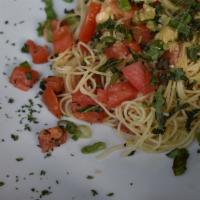Capellini Checca · Angel hair pasta, fresh tomato, basil, olive oil and garlic sauce.