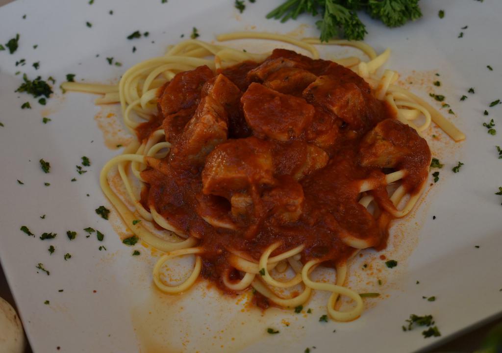 Spaghetti Salsiccia · Italian mild sausage in a marinara sauce.