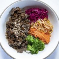 Bulgogi Rice · Marinated Sliced Beef Rib Eye, White Rice, Onion, Bulgogi Sauce, Served with Broccoli, Bean ...