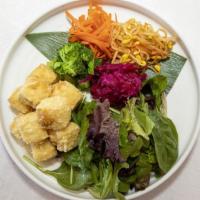 Green Lovers Box · Crispy tofu, salad, banchan platter.