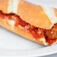 Meatball Sub (Regular) · Beef meatballs cooked in marinara sauce, melted provolone cheese, topped with parmesan chees...