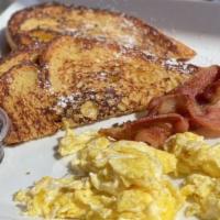 French Toast Combo · 2 pieces French toast, 2 eggs, 2 bacon, powdered sugar and syrup.