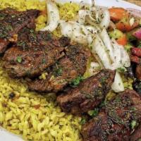 Steak Plate · All plates are served with rice, your choice of two sides, pita bread, and pickles.