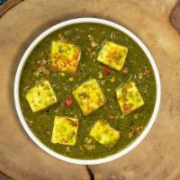 Palak Pack Paneer · Cottage cheese cooked with blended Indian spices and spinach sauce.